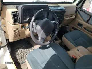 1999 Jeep Wrangler Sahara с VIN 1J4FY49S3XP482537, выставлен на аукционе Copart как лот 56517845 с пробегом 219 684 миль миль и Чистый • Clean title. История ставок и продаж доступна на DreamBid. Изображение 8.