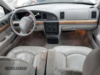 1999 Lincoln Continental with VIN 1LNHM97VXXY608466, listed as a Copart auction lot 45400935 with 155,333 mi miles and Salvage Title. Bid and sale history available at DreamBid. Image 8.