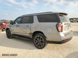 2023 Chevrolet Suburban RST with VIN 1GNSCEKD9PR556589, listed as a Copart auction lot 76045104 with 7,411 mi miles and Salvage Title. Bid and sale history available at carsss.com. Image 2.