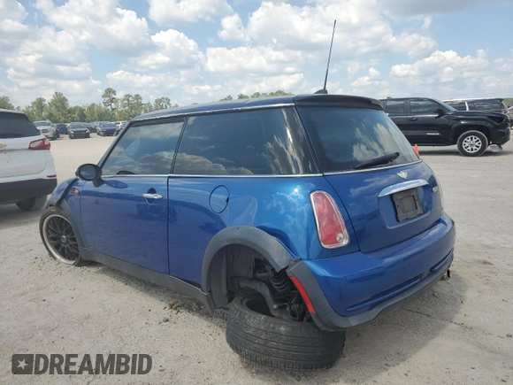 2006 MINI Hardtop with VIN WMWRC33566TK15023, listed as a Copart auction lot 76392014 with Not provided miles and Salvage title. Bid and sale history available at DreamBid. Image 2.