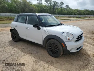 2015 MINI Countryman with VIN WMWZB3C52FWM33204, listed as a Copart auction lot 51680405 with 154,839 mi miles and Salvage Title. Bid and sale history available at DreamBid. Image 4.