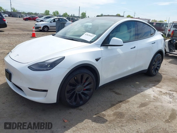 2021 Tesla Model Y Performance z VIN 5YJYGDEF7MF277769, wystawiony jako IAAI lot #42025157 z przebiegiem 28 522 mil mil oraz . Historia ofert i sprzedaży dostępna na DreamBid. Obrazek 2.