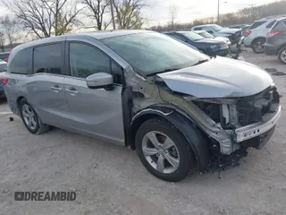 2018 Honda Odyssey EX-L with VIN 5FNRL6H72JB045639, listed as a IAAI auction lot 41821993 with 60,737 mi miles. Bid and sale history available at carsss.com. Image 1.