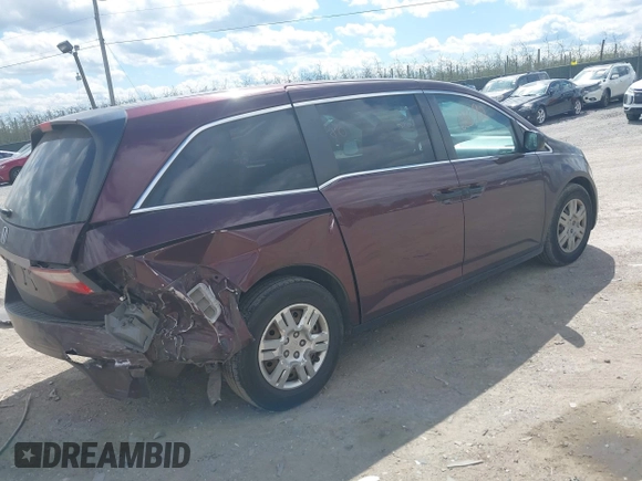 2013 Honda Odyssey LX with VIN 5FNRL5H28DB058401, listed as a IAAI auction lot 42050892 with 221,016 mi miles and . Bid and sale history available at carsss.com. Image 4.