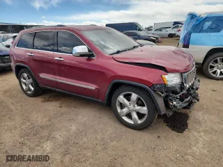 2012 Jeep Grand Cherokee Overland with VIN 1C4RJFCT4CC250602, listed as a Copart auction lot 49503905 with 149,016 mi miles and Salvage Title. Bid and sale history available at carsss.com. Image 4.