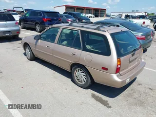1999 Ford Escort SE z VIN 3FAFP15P9XR164302, wystawiony jako IAAI lot #42379366 z przebiegiem 111 509 mil mil oraz . Historia ofert i sprzedaży dostępna na DreamBid. Obrazek 3.