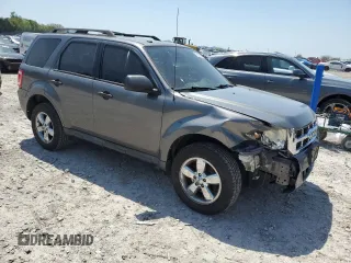 2011 Ford Escape XLT with VIN 1FMCU0D74BKA19310, listed as a Copart auction lot 52360255 with 232,575 mi miles and Salvage Title. Bid and sale history available at carsss.com. Image 4.