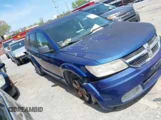 2009 Dodge Journey SXT with VIN 3D4GG57V89T551949, listed as a IAAI auction lot 41874310 with 170,084 mi miles. Bid and sale history available at carsss.com. Image 1.