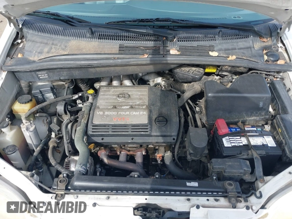 2002 Toyota Sienna LE with VIN 4T3ZF13CX2U506371, listed as a IAAI auction lot 42058440 with 215,434 mi miles. Bid and sale history available at carsss.com. Image 10.