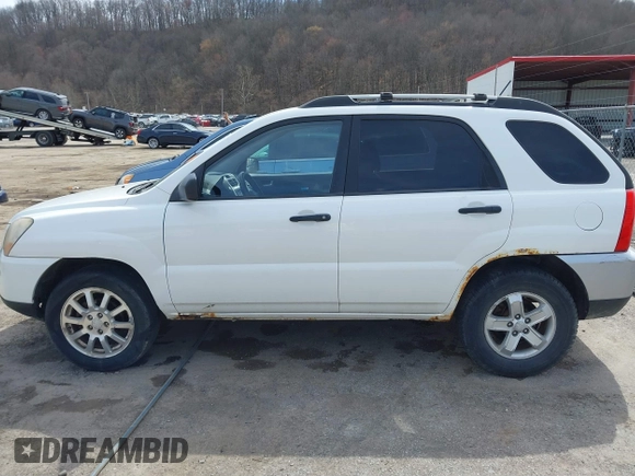 2009 Kia Sportage LX with VIN KNDJE723597560168, listed as a IAAI auction lot 41824779 with 110,386 mi miles. Bid and sale history available at carsss.com. Image 14.