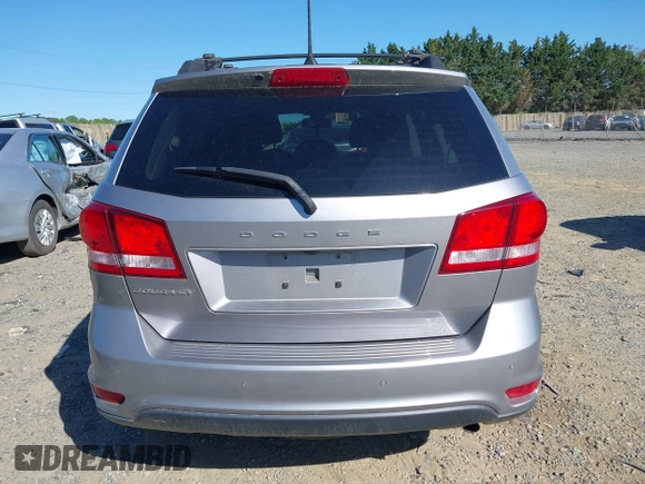 2019 Dodge Journey SE with VIN 3C4PDCBB7KT872524, listed as a IAAI auction lot 42093711 with 86,519 mi miles and . Bid and sale history available at DreamBid. Image 17.