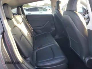 2022 Tesla Model Y Long Range z VIN 7SAYGAEE9NF366382, wystawiony jako Copart lot #52179515 z przebiegiem 41 654 mil mil oraz Szkoda całkowita • Salvage title. Historia ofert i sprzedaży dostępna na DreamBid. Obrazek 12.