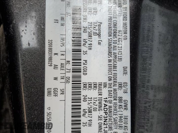 2018 Ford Focus Titanium z VIN 1FADP3N21JL295883, wystawiony jako Copart lot #59051015 z przebiegiem 43 284 mil mil oraz Szkoda całkowita • Salvage title. Historia ofert i sprzedaży dostępna na DreamBid. Obrazek 12.