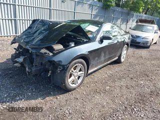 2012 Ford Mustang Premium with VIN 1ZVBP8AM1C5288023, listed as a IAAI auction lot 42486009 with 143,525 mi miles and . Bid and sale history available at DreamBid. Image 16.