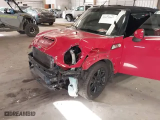 2014 MINI Cooper Convertible S with VIN WMWZP3C59ET298305, listed as a IAAI auction lot 41679657 with 77,736 mi miles. Bid and sale history available at carsss.com. Image 6.