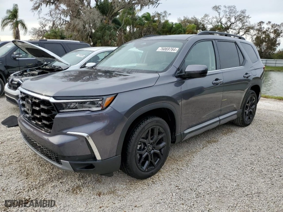 2025 Honda Pilot Touring with VIN 5FNYG2H75SB002553, listed as a Copart auction lot 76869764 with 7,426 mi miles and Salvage Title. Bid and sale history available at carsss.com. Image 1.