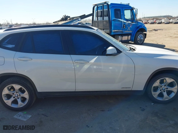 2015 BMW X1 sDrive28i with VIN WBAVM1C51FVZ94433, listed as a IAAI auction lot 41425205 with 148,346 mi miles. Bid and sale history available at carsss.com. Image 13.