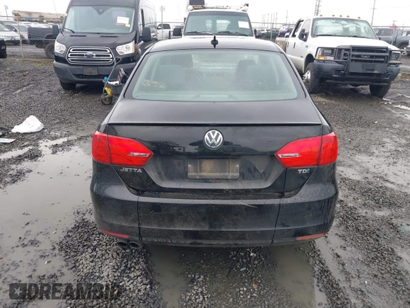 2014 Volkswagen Jetta TDI w/Premium with VIN 3VWLL7AJ1EM406360, listed as a IAAI auction lot 41857580 with 93,333 mi miles and . Bid and sale history available at DreamBid. Image 16.