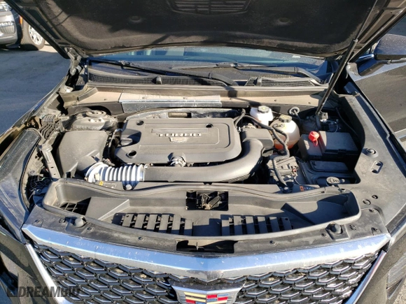 2024 Cadillac XT4 AWD Premium Luxury with VIN 1GYFZDR49RF128402, listed as a Copart auction lot 77630154 with 20,673 mi miles and Salvage Title. Bid and sale history available at carsss.com. Image 12.