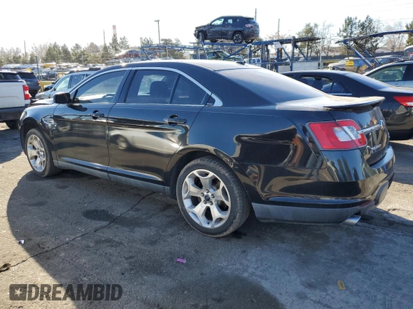 2011 Ford Taurus SHO with VIN 1FAHP2KT6BG128180, listed as a Copart auction lot 47462885 with 128,403 mi miles and Salvage Title. Bid and sale history available at DreamBid. Image 2.