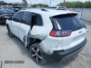 2019 Jeep Cherokee Limited with VIN 1C4PJLDB8KD402904, listed as a IAAI auction lot 42107306 with 96,677 mi miles and . Bid and sale history available at DreamBid. Image 3.