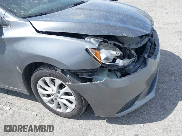 2018 Nissan Sentra SV with VIN 3N1AB7AP0JL627243, listed as a IAAI auction lot 41822674 with 144,841 mi miles and . Bid and sale history available at carsss.com. Image 12.
