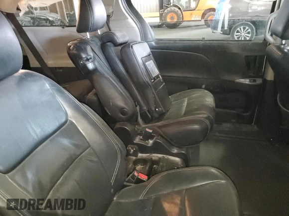 2015 Toyota Sienna SE with VIN 5TDXK3DC8FS662302, listed as a Copart auction lot 57995425 with 181,379 mi miles and Salvage title. Bid and sale history available at DreamBid. Image 11.