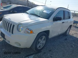 2008 Jeep Compass Sport with VIN 1J8FT47W88D642742, listed as a IAAI auction lot 41904499 with 130,179 mi miles. Bid and sale history available at carsss.com. Image 2.