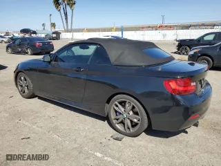 2015 BMW 2 Series M235i with VIN WBA1M1C56FV393730, listed as a Copart auction lot 45348734 with 59,231 mi miles and Salvage Title. Bid and sale history available at carsss.com. Image 2.