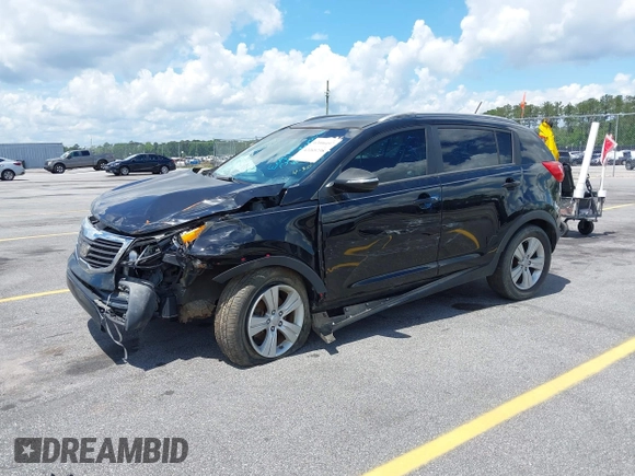 2013 Kia Sportage LX z VIN KNDPB3A27D7428624, wystawiony jako IAAI lot #42265738 z przebiegiem 91 244 mil mil oraz . Historia ofert i sprzedaży dostępna na DreamBid. Obrazek 2.