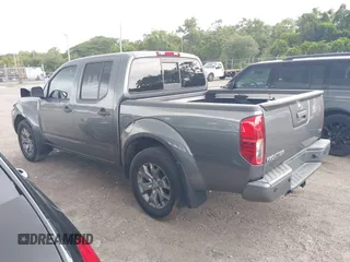 2020 Nissan Frontier SV with VIN 1N6ED0EA3LN715094, listed as a IAAI auction lot 42394885 with 26,576 mi miles and . Bid and sale history available at DreamBid. Image 3.