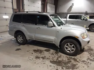 2002 Mitsubishi Montero LTD with VIN JA4MW51R02J016667, listed as a IAAI auction lot 41267504 with 167,446 mi miles. Bid and sale history available at carsss.com. Image 1.