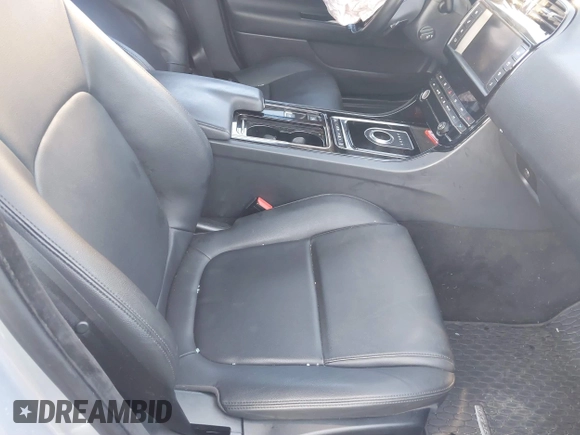 2018 Jaguar XE with VIN SAJAR4FN0JCP33509, listed as a IAAI auction lot 41105100 with 74,603 mi miles and . Bid and sale history available at DreamBid. Image 5.