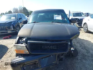 2004 GMC Sonoma SLS with VIN 1GTDT13X74K107743, listed as a IAAI auction lot 41767517 with 254,323 mi miles. Bid and sale history available at carsss.com. Image 13.