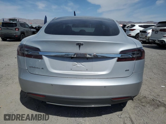 2014 Tesla Model S 60 with VIN 5YJSA1H11EFP49407, listed as a Copart auction lot 52215955 with 109,827 mi miles and Salvage Title. Bid and sale history available at DreamBid. Image 6.