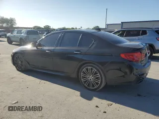 2018 BMW 5 Series M550i xDrive with VIN WBAJB9C52JB035913, listed as a Copart auction lot 51441195 with 42,205 mi miles and Salvage Title. Bid and sale history available at carsss.com. Image 2.