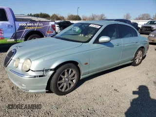 2003 Jaguar S-Type with VIN SAJEA01T93FM46260, listed as a Copart auction lot 87573835 with 129,563 mi miles and Clean Title. Bid and sale history available at DreamBid. Image 1.