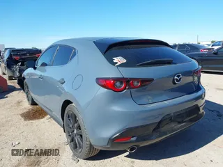 2023 Mazda 3 S Carbon Edition with VIN JM1BPBLM8P1611106, listed as a IAAI auction lot 42191902 with 37,244 mi miles and . Bid and sale history available at DreamBid. Image 3.