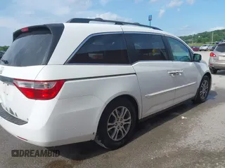 2011 Honda Odyssey EX-L with VIN 5FNRL5H60BB026171, listed as a IAAI auction lot 42511296 with 288,827 mi miles and . Bid and sale history available at DreamBid. Image 13.