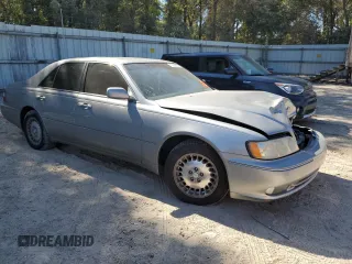 2001 Infiniti Q45 Touring z VIN JNKBY31A41M100380, wystawiony jako Copart lot #72982594 z przebiegiem Nie podano mil oraz Nie do naprawy. Historia ofert i sprzedaży dostępna na DreamBid. Obrazek 4.