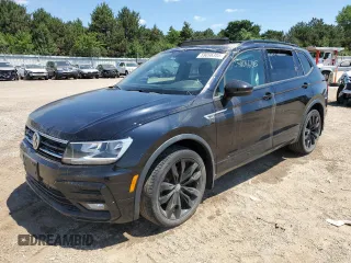 2021 Volkswagen Tiguan SE with VIN 3VV2B7AX2MM051902, listed as a Copart auction lot 59096385 with 32,055 mi miles and Salvage title. Bid and sale history available at DreamBid. Image 1.