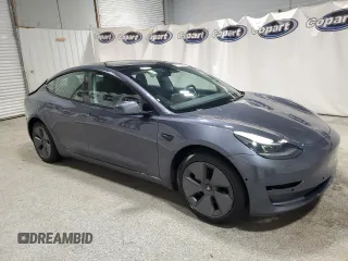 2022 Tesla Model 3 with VIN 5YJ3E1EA8NF287506, listed as a Copart auction lot 55674145 with 106,745 mi miles and Clean Title. Bid and sale history available at DreamBid. Image 4.