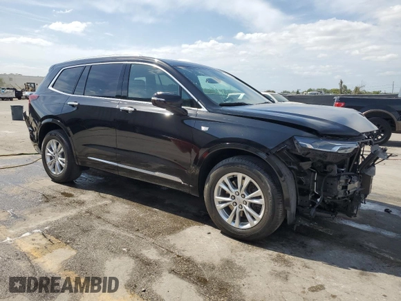 2023 Cadillac XT6 FWD Luxury z VIN 1GYKPAR45PZ187400, wystawiony jako Copart lot #54562335 z przebiegiem 16 953 mil mil oraz Szkoda całkowita • Salvage title. Historia ofert i sprzedaży dostępna na DreamBid. Obrazek 4.