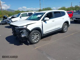 2019 Hyundai Santa Fe SE with VIN 5NMS2CAD5KH081604, listed as a IAAI auction lot 41526082 with 50,279 mi miles. Bid and sale history available at carsss.com. Image 18.