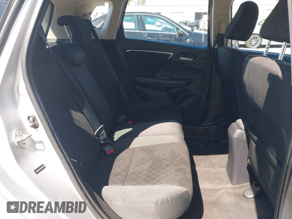 2015 Honda Fit LX z VIN 3HGGK5H51FM750102, wystawiony jako IAAI lot #42278830 z przebiegiem 121 855 mil mil oraz . Historia ofert i sprzedaży dostępna na DreamBid. Obrazek 8.