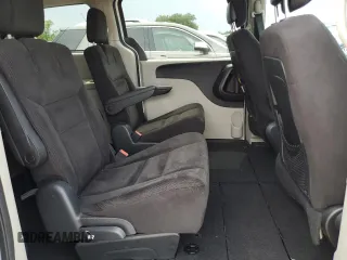 2014 Dodge Grand Caravan SXT z VIN 2C4RDGCG7ER214087, wystawiony jako Copart lot #61096815 z przebiegiem 131 241 mil mil oraz Czysty tytuł • Clean title. Historia ofert i sprzedaży dostępna na DreamBid. Obrazek 11.