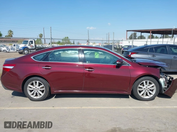 2015 Toyota Avalon Limited with VIN 4T1BK1EB6FU164272, listed as a IAAI auction lot 41891894 with 207,847 mi miles and . Bid and sale history available at DreamBid. Image 13.