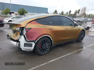 2023 Tesla Model Y Performance with VIN 7SAYGDEF4PF738885, listed as a IAAI auction lot 41798997 with 59,270 mi miles and . Bid and sale history available at DreamBid. Image 4.