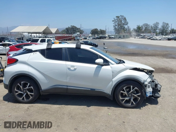 2018 Toyota C-HR XLE with VIN NMTKHMBX8JR036857, listed as a IAAI auction lot 42667018 with 63,058 mi miles and . Bid and sale history available at DreamBid. Image 14.