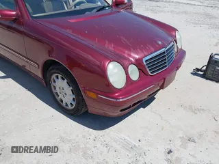 2000 Mercedes-Benz E-Class with VIN WDBJF65J1YB018240, listed as a IAAI auction lot 42051187 with 186,651 mi miles. Bid and sale history available at carsss.com. Image 6.